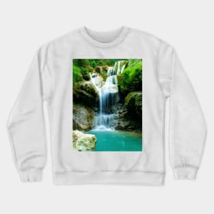 Waterfall over rocks into turquoise lake Crewneck Sweatshirt